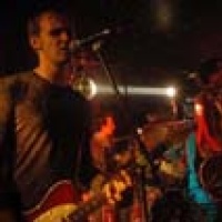 Huggie & The Glitters en concert