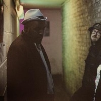 King Midas Sound en concert